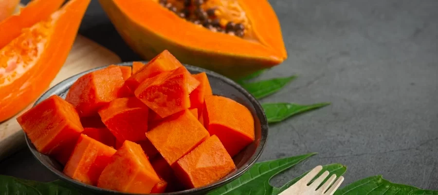 fresh-papaya-cut-into-pieces-put-black-plate-scaled-qxosje7q0e8urf7madtoc3pl8eipm424v9y4jwnrts-1
